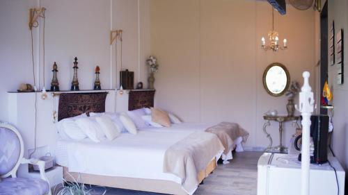 Postel nebo postele na pokoji v ubytování Magma "Eco Hotel Cabañas"