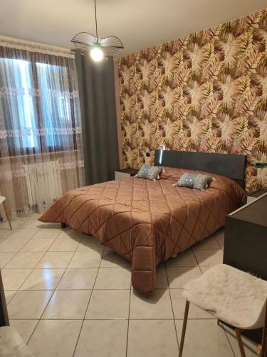 Кровать или кровати в номере Casa di Elena