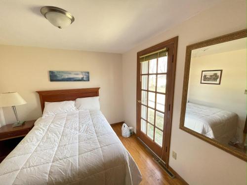 Postel nebo postele na pokoji v ubytování Plantation Motel