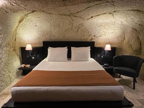 Ένα ή περισσότερα κρεβάτια σε δωμάτιο στο Casa Cappadocia