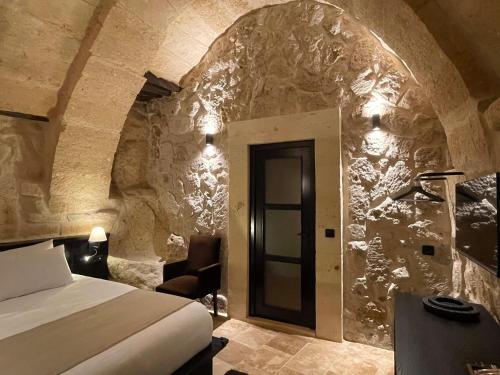 Ένα ή περισσότερα κρεβάτια σε δωμάτιο στο Casa Cappadocia