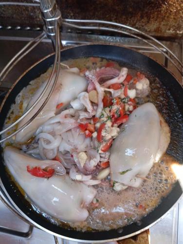a pot of food with a spoon in it at Yacht-Urlaub in den Buchten von Datca in Datca