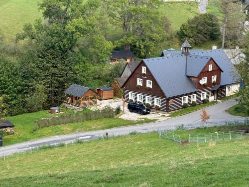 an aerial view of a house with a road at Penzion Zvonička in Trutnov