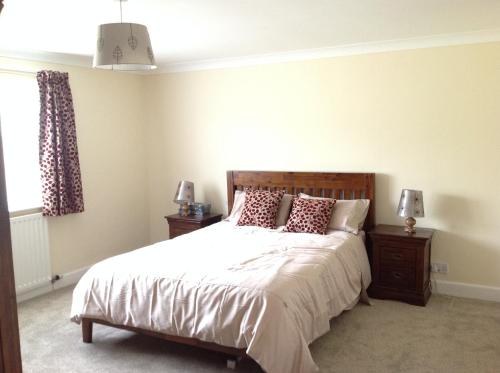 Un pat sau paturi într-o cameră la Stow House