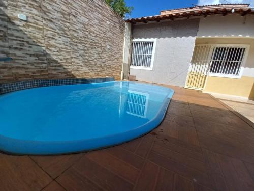 Πισίνα στο ή κοντά στο Casa com lazer até 12 pessoas