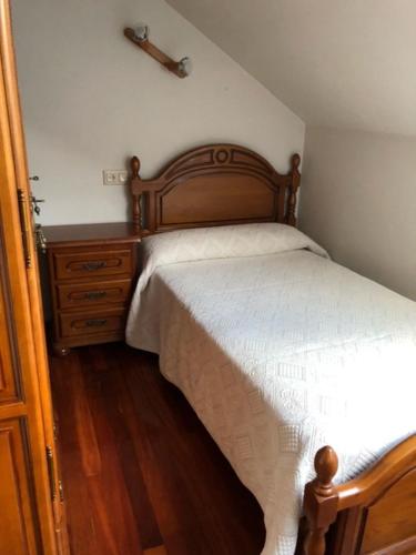 Ένα ή περισσότερα κρεβάτια σε δωμάτιο στο Apartamento Rio Sella 2