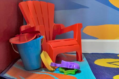 a toy set of plastic chairs and a cup at Epic Orlando Mansion-Pool-Game Room-Theater-2 in Orlando