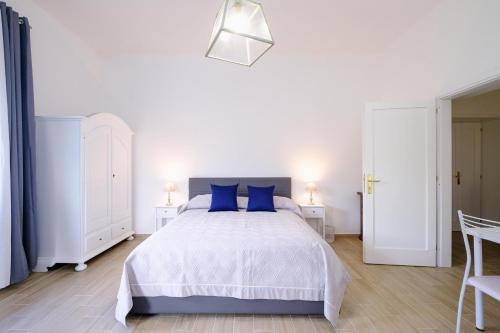 Ένα ή περισσότερα κρεβάτια σε δωμάτιο στο Domus Ilex- in VIA LIVORNO 6