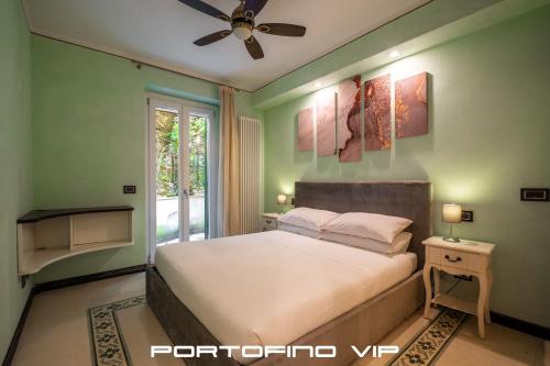 Ένα ή περισσότερα κρεβάτια σε δωμάτιο στο Portofino Flat by PortofinoVip