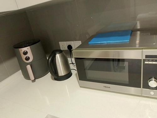 Dapur atau dapur kecil di Agile Orchid service residence TRX by KL