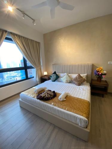 Katil atau katil-katil dalam bilik di Agile Orchid service residence TRX by KL