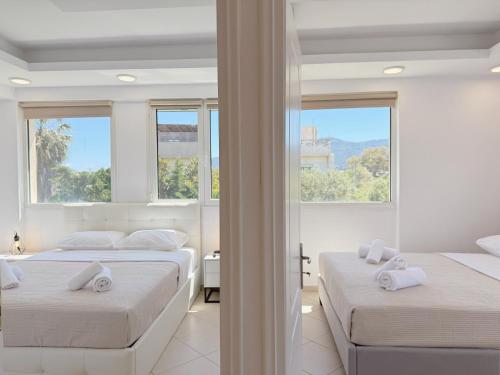 Ένα ή περισσότερα κρεβάτια σε δωμάτιο στο Beachfront 3bedroom apartment