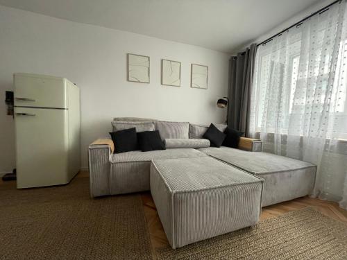 Postel nebo postele na pokoji v ubytování Klimatyczny apartament w centrum