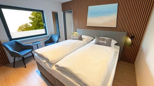 Postel nebo postele na pokoji v ubytování Kaap2 - Boutique Hotel