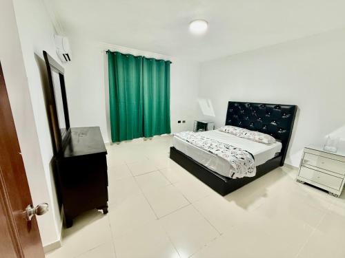 Postel nebo postele na pokoji v ubytování corales apartamento lll