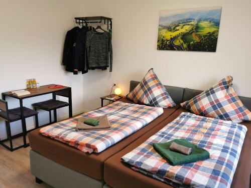 Speedy's Aparthotel & B&Bにあるベッド