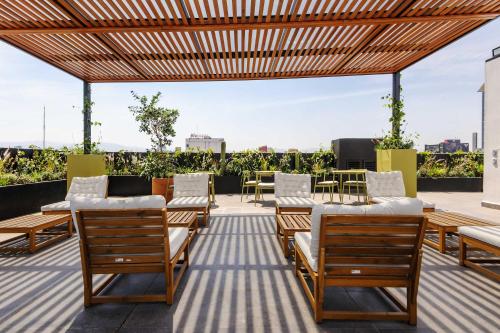 Un lugar para sentarse en Colima 340 by Wynwood House