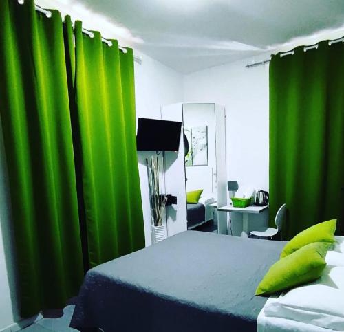 Postel nebo postele na pokoji v ubytování Hotel Birillo