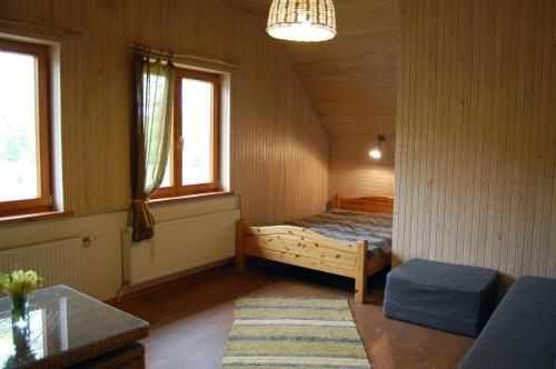 Кровать или кровати в номере Pūjalgi