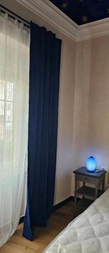 Letto o letti in una camera di Blu Oltremare camere bijoux