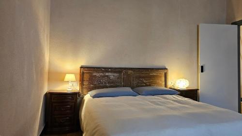 Letto o letti in una camera di Blu Oltremare camere bijoux