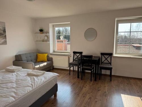 Postel nebo postele na pokoji v ubytování Apartament w porcie