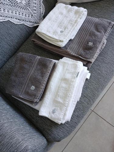 a pile of towels sitting on top of a rug at Departamento Poeta in Salta