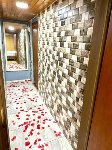 a room with red poppies on the floor at Cendere Old City Hotel in Istanbul