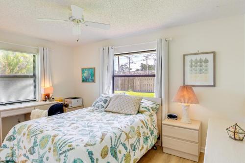 A bed or beds in a room at 2 Mi to Water Sebastian Home with Heated Pool!