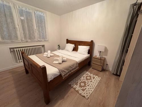 Ένα ή περισσότερα κρεβάτια σε δωμάτιο στο Grande maison centre ville - 5CH - 14 Pers