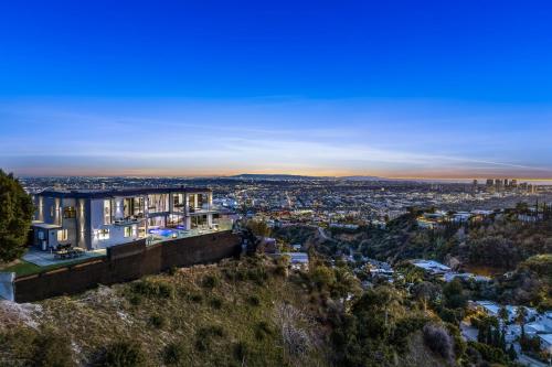 a view of the city from the top of a hill at Ocean to City Views, Fire Feature, Water falls Dream Oasis in Los Angeles