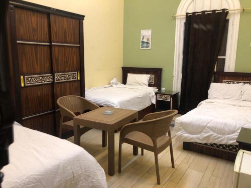 Katil atau katil-katil dalam bilik di Boutique Centro Citta Hotel