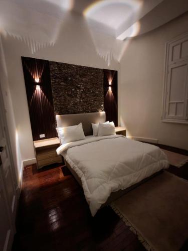 Katil atau katil-katil dalam bilik di Boutique Centro Citta Hotel
