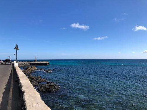 a view of the ocean from a pier at Casa Chacho, Punta Mujeres in Punta de Mujeres