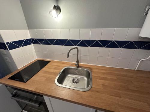 Cuisine ou kitchenette dans l'établissement Appartement cosy avec vue sur les montagnes