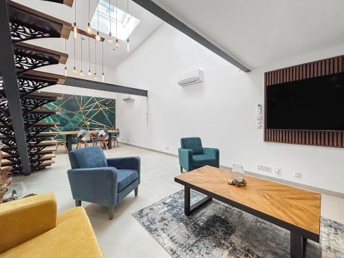 Μια τηλεόραση ή/και κέντρο ψυχαγωγίας στο Le loft du canal de Rompsay