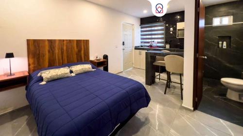 Ένα ή περισσότερα κρεβάτια σε δωμάτιο στο Lofts Arsénico