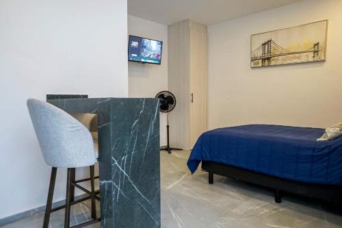 Ένα ή περισσότερα κρεβάτια σε δωμάτιο στο Lofts Arsénico
