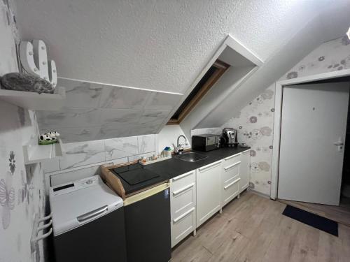 Kuchyň nebo kuchyňský kout v ubytování Ferienwohnung in Neuenhagen