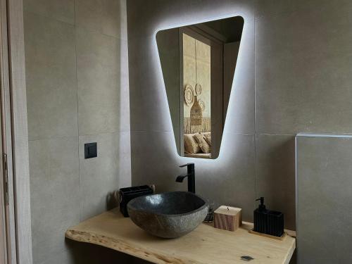 a bathroom with a sink and a mirror at XTC Villas Kefalonia - Villa X in Argostoli