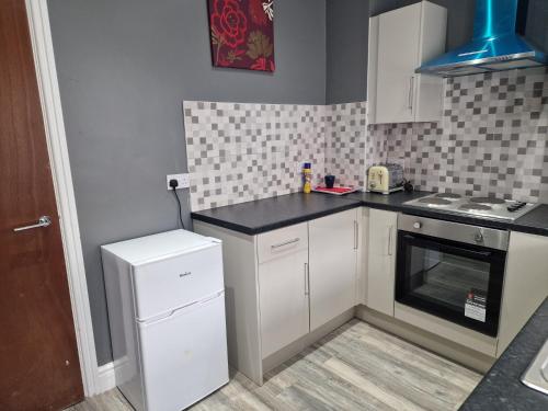 Dapur atau dapur kecil di Stella Villa Bradford