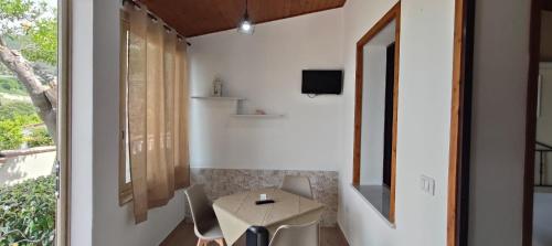 TV a/nebo společenská místnost v ubytování Residenza La Grazia Tropea - Free Parking -