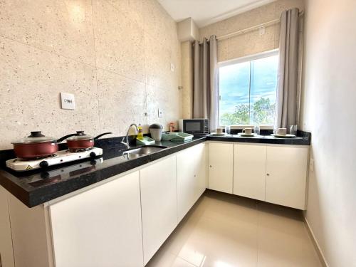 Кухня или мини-кухня в Your Home - Studios Boutique Hotel

