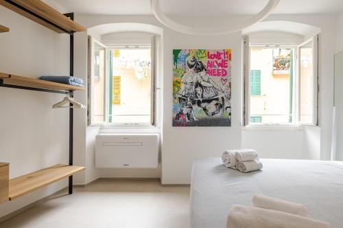 Кровать или кровати в номере ItalHouse exclusive apt in the center Riomaggiore