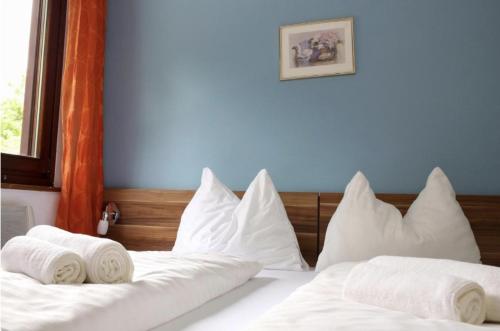 Cama o camas de una habitación en Apartmenthotel Karawankenblick