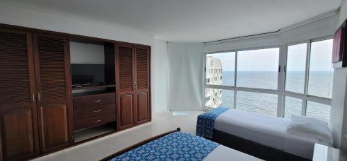 Postel nebo postele na pokoji v ubytování Live Stay - Torres del Lago