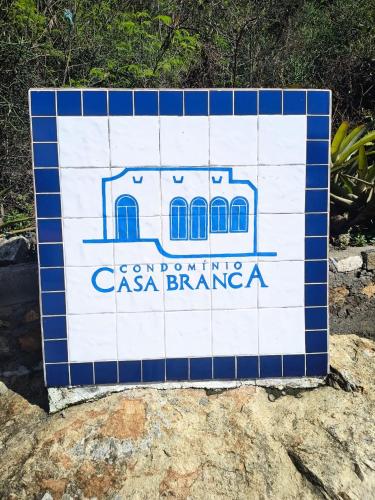 Et logo, certifikat, skilt eller en pris der bliver vist frem på Casa Branca 39 - Pontal do Atalaia