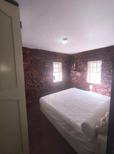 En eller flere senge i et værelse på Casa Branca 39 - Pontal do Atalaia