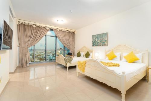 Cama o camas de una habitación en Ocean View Luxury Suites