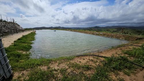 a body of water on the side of a road at Portugals Infinity Eco Suite Resort in Tavira
